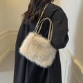 Elegant beige faux fur handbag with a soft plush texture and a slim leather strap - Light Khaki