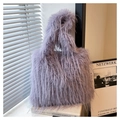 Detail of lavender faux fur tote bag showing soft plush texture and fuzzy handle - Purple