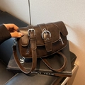 Vintage dark brown matte leather saddle bag with large silver buckle and adjustable strap - Coffee