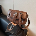 Retro brown faux leather saddle bag with decorative silver buckles and shoulder strap - Brown