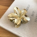 Elegant gold plumeria flower metal hair claw clip for stylish women's bun styles - Yellow Flower Hair Claw