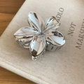 Elegant silver metallic flower hair claw clip with wavy petals and smooth glossy finish - Claw Clip - Silver Flower