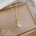 Detailed close-up of crown heart necklace with clear zircons on premium leather case - Purple Heart Style (F322)