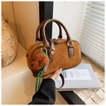 Vintage brown suede crossbody bag with teddy bear pendant and elegant handle detail - Brown with Pendant