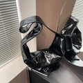Glossy black leather hobo shoulder bag with a wide strap and minimalist slouchy design - Black