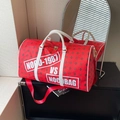 Large capacity red PU leather travel bag with white handles and artistic logo print - Red