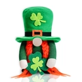 Macro shot of St. Patrick's Day gnome featuring green felt hat and orange braids details - Braid Style (With Shamrock)