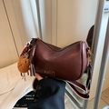 Deep burgundy Boston handbag with wide shoulder strap and plush bear pendant detail - Burgundy Red With Charm