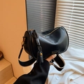 Classic black Boston bag with gold hardware and wide fabric strap in handheld view - Black Without Pendant