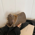 Brown leather Boston barrel bag with wide shoulder strap and gold-tone hardware - Mud Color Without Pendant