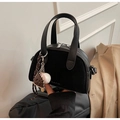 Black semi-circular crossbody bag with leather texture and baseball glove pendant - Black with Charm