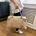 Beige large capacity travel tote bag made of waterproof nylon for fitness and short trips - Beige