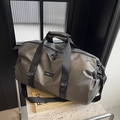 Dark grey waterproof Oxford travel bag with reinforced black handles and logo detail - Khaki