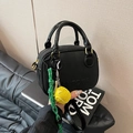 Black mini leather handbag with ANTOOR embossed logo and yellow baseball charm - Black with Pendant