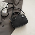 Elegant black crossbody bag with matte finish and gold hardware on grey suit - Black without Pendant