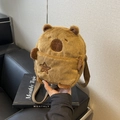 Cute brown capybara plush crossbody bag featuring soft fur and star embroidery detail - Brown