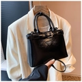 Fashionable black glossy leather tote bag with silver triangle logo and handle strap - Black
