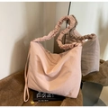 Light pink nylon crossbody bag with stylish ruched cloud-style shoulder strap - Pink