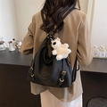 Versatile black pebbled leather backpack for women with a cute white teddy bear charm - Black (With Charm)