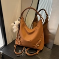 Brown lychee leather hobo bag with gold hardware and white plush bear charm - Brown (With Pendant)
