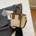 Elegante beige-braune Eimertasche aus Leder mit Tragegriff und goldener Hardware für Damen - Weiß Braun Splicing Ohne Anhänger