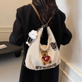 Off-white canvas hobo tote with teddy bear embroidery and brown leather strap - With Pendant / Off White