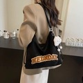 Black large-capacity shoulder bag with HELNDAY letter patches and white cloud plush charm - Black