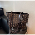 Detail of dark brown tote bag with B-monogram pattern and a small bear charm accessory - Coffee (With Charm)