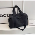 Detail of black multi-functional sports bag with wide adjustable strap and brand logo - Black