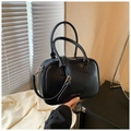 Matte black leather Boston bag with gold branding and adjustable shoulder strap - Black with Pendant