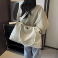 Large cream white faux leather travel bag with detachable strap and embossed logo - Off White