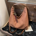 Caramel brown suede hobo bag with braided rope charm and large capacity tote design - Brown with Pendant
