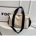 Beige large capacity sports travel bag with black handles and NINGJIA logo details - Off-white
