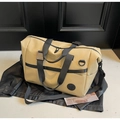 Borsa da viaggio kaki grande in ecopelle con tracolla e manici in nylon nero - Cachi