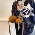 Vintage brown frosted leather Boston bag for women with a cute teddy bear charm - Brown