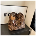 Leopard print bucket bag with drawstring closure and brown plush bear charm detail - Khaki