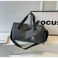Detail of grey travel bag with NINGJIA logo and adjustable strap on modern display - Dark Gray