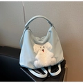 Detail view of the light blue nylon tote with plush puppy applique and metal ring - Blue Puppy