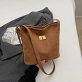 Caramel brown faux suede bucket bag with gold hardware and shoulder strap details - No Pendant / Brown