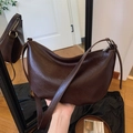 Retro dark brown crescent shoulder bag with glossy texture and wide adjustable strap - Brown