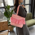 Pink ruffle tote bag with large capacity shown in a stylish lifestyle setting - Pink