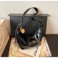 Glossy black oil-wax leather hobo bag with brown braided knots and leaf charm in a gift box - Black with Pendant