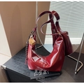 Dark red crescent shoulder bag in glossy leather with cute bear charm and tassel - Red with Pendant