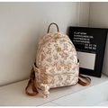 Mini cream backpack with brown teddy bear print, gold rivets and cute bear charm - Beige With Charm