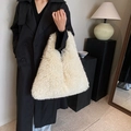Creamy white plush tote bag in faux fur with a modern triangular silhouette for winter - White