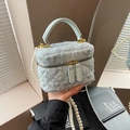 Light blue tweed bucket bag with pearl strap and quilted texture in handbag style - Light Blue