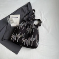 Black bucket bag with colorful embroidered waves and wide strap for casual wear - Black without Pendant