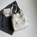 White quilted tote bag with multi-color embroidery and wide strap on grey blazer - Off-white Without Pendant
