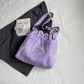 Large purple bucket tote bag featuring embroidered vertical lines and drawstring closure - Purple Without Pendant