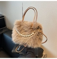 Detail shot of brown plush handbag featuring decorative pearl chain and soft texture - Dark Khaki